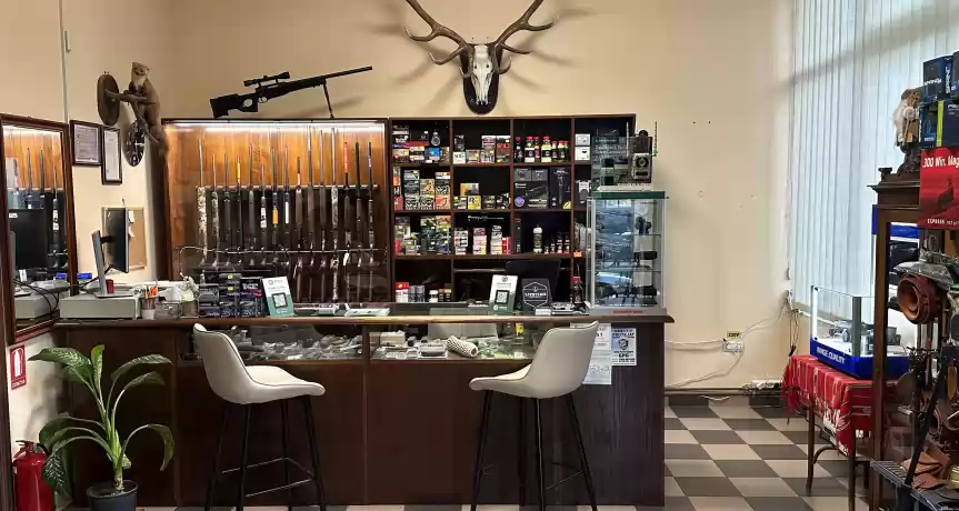 Afacere în domeniul armelor și munițiilor